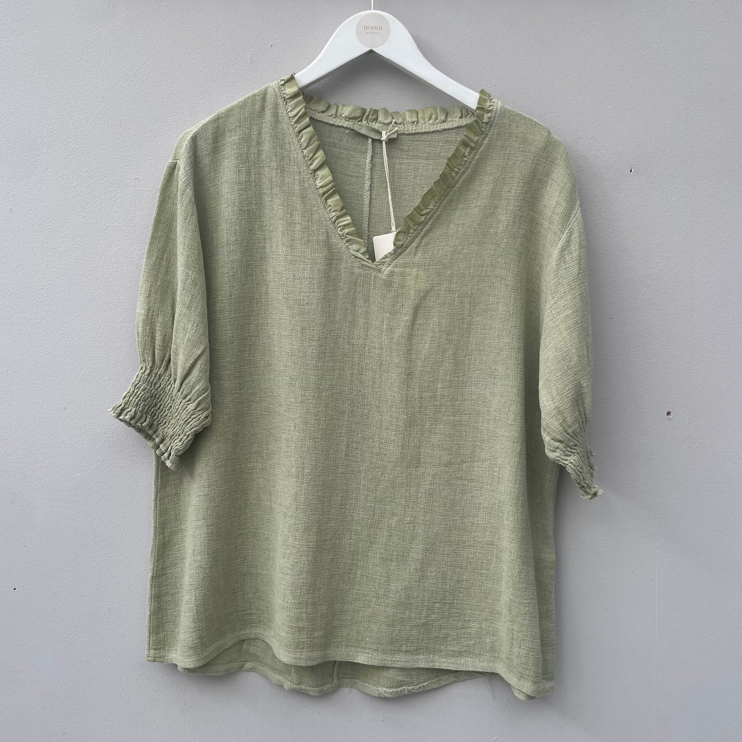 The Gaby Frill V Neck Top