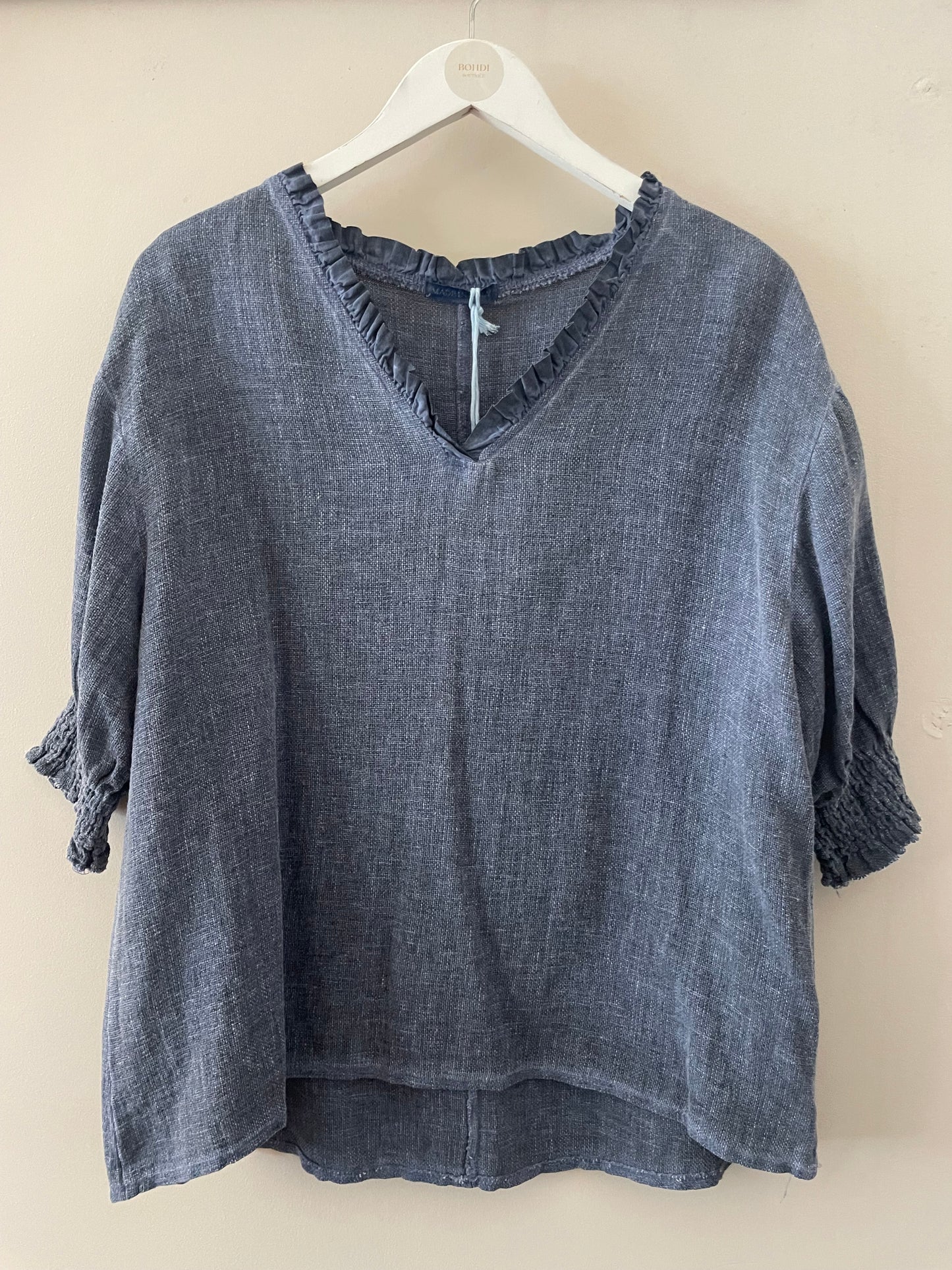 The Gaby Frill V Neck Top