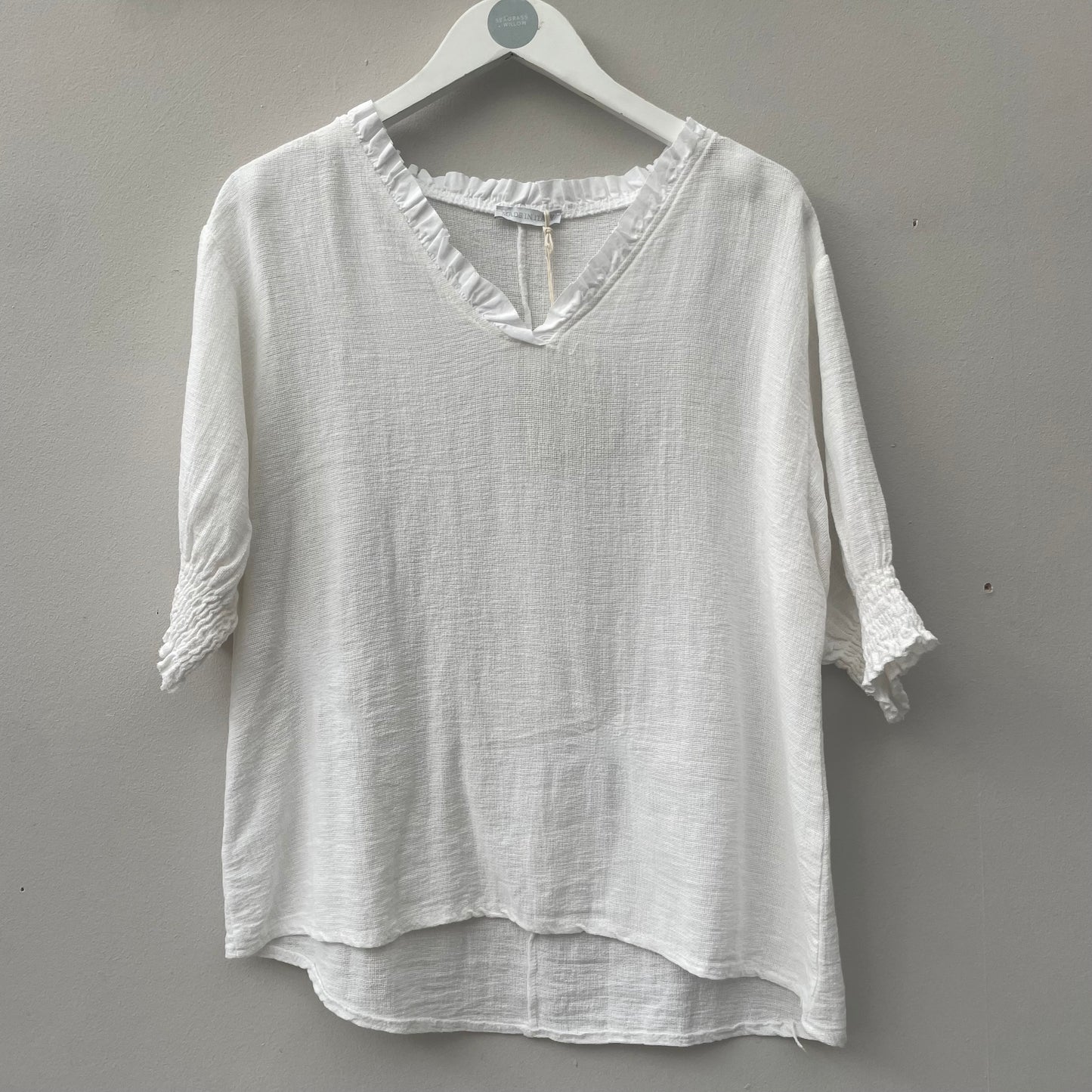 The Gaby Frill V Neck Top